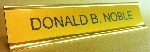 Gold background, Black lettering, Gold holder
